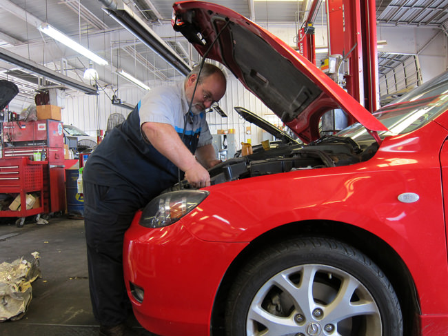 Don under the hood of this Mazda